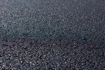 Asphalt road close-up, road works