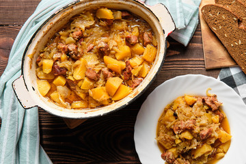 Meat stew with potato and cabbage, top view