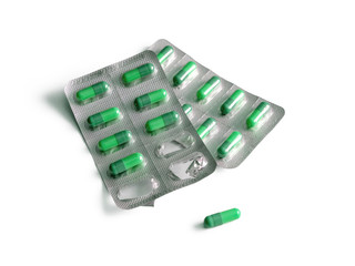 Blister packs with green capsules