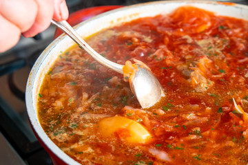 A bowl of red Ukrainian borshch (borsh), healthy food.