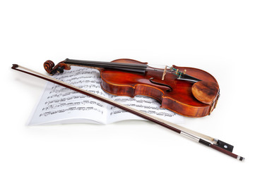 Fototapeta na wymiar Violin with notes on white background