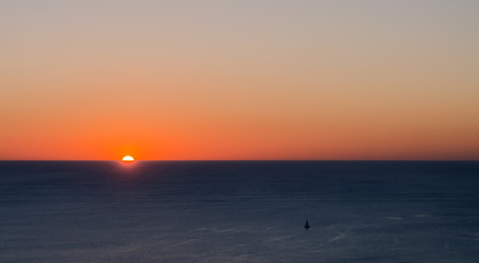 Fototapeta na wymiar sea sailing by sunset
