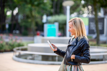 Beautiful girl with smart phone conversation