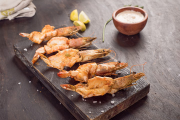 Sea food meal fried and roasted and grilled fish and Shrimps 