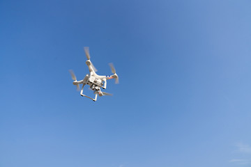 a drone that flies in the sky and takes aerial shots