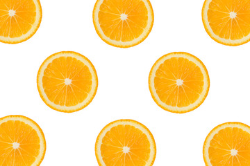 Colorful fruit pattern of fresh orange or lemon slices on white isolated background. Top view.