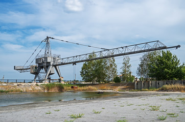 Fototapeta premium Construction crane converted to earth moving machine