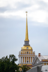 Saint Petersburg, Russia, august 2019. City detail, the goldetn tip of the Admiralteystvo in the Alexander Garden seen from the street