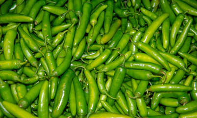 Hot green chili peppers shot from above, full frame
