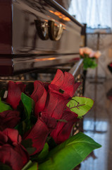 closeup shot of a colorful casket in a hearse or chapel before funeral or burial at cemetery