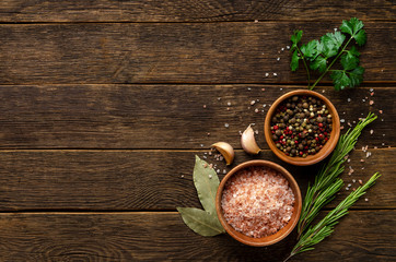 Various spices on wooden background. Top view