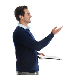 Young male teacher with laptop on white background