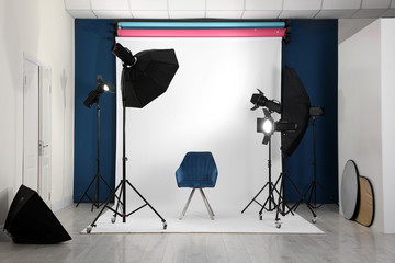 Photo studio interior with set of professional equipment