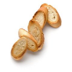 Toasted baguette slices isolated on white background close up.  Toast, crouton.   Top view.