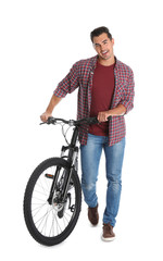 Fototapeta na wymiar Handsome young man with modern bicycle on white background