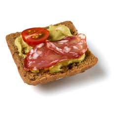 Canape with salami. Open faced sandwich crostini isolated on white background closeup. Appetizer tartarine.