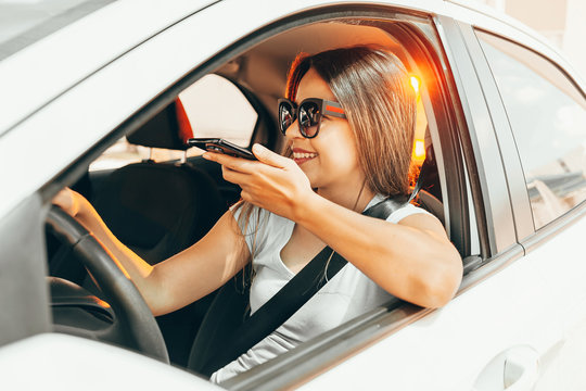 Distracted woman driving while talking on the cellphone