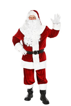 Happy authentic Santa Claus waving on white background