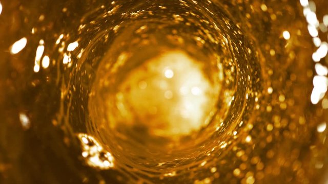 Super slow motion of pouring fuel oil in whirl shape. Filmed on high speed cinema camera, 1000 fps.