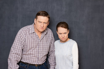 Portrait of angry and annoyed couple