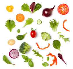 Creative layout made of tomato slice, onion, cucumber, basil leaves. Flat lay, top view. Food concept. Vegetables isolated on white background. Food ingredient pattern.