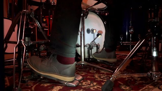 Man Playing Drum Kit