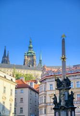 Fototapeta na wymiar The St. Nicholas Church and the streets of Prague, Czech Republic.