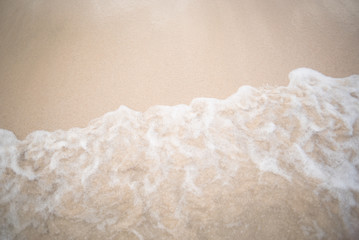 Seafoam on beach
