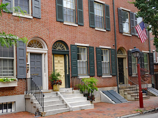 Row of brick American colonial style  townhouses