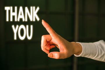 Writing note showing Thank You. Business concept for a polite expression used when acknowledging a...