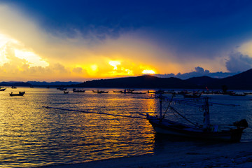 Sunset with silhouette Baan Koh Teab beach