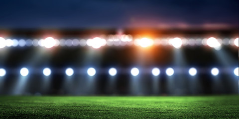 Empty night football arena in lights © Sergey Nivens