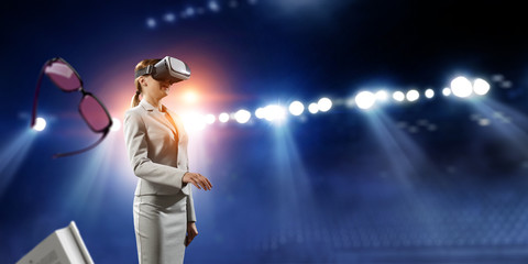 Fototapeta na wymiar Young female in virtual reality