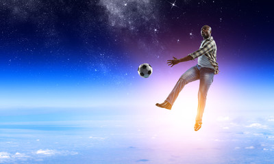 Obraz na płótnie Canvas Black man plays his best soccer match