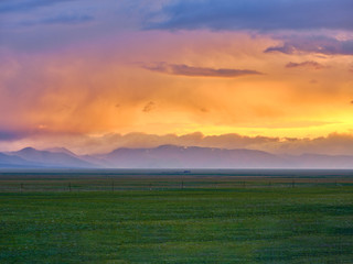 sunset time of human grassland in xinjiang