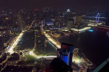 Foto op Plexiglas Singapore Formula One Circuit and cityscape at night © Em Campos