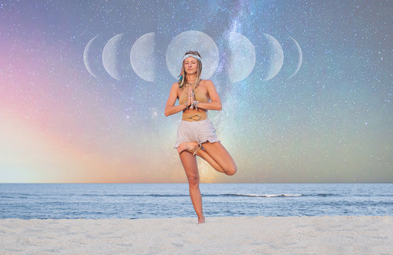 Beautiful woman is practicing yoga on the beach on Milky Way background.