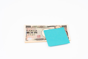 Ten thousand yen banknote with post-it paper