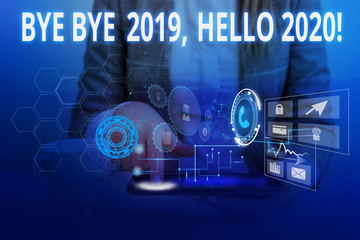 Word writing text Bye Bye 2019 Hello 2020. Business photo showcasing saying goodbye to last year and welcoming another good one Woman wear formal work suit presenting presentation using smart device