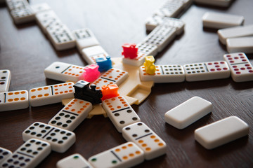Mexican Train Game showing dominoes, trains and play setup.  A great game for family or friends. - obrazy, fototapety, plakaty