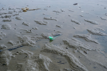 Lok Kawi, Kota Kinabalu, Sabah, Malaysia - September 08, 2019: There is a lot of rubbish left in Lok Kawi Beach. This rubbish are dumped into the sea and washed away to this beach.