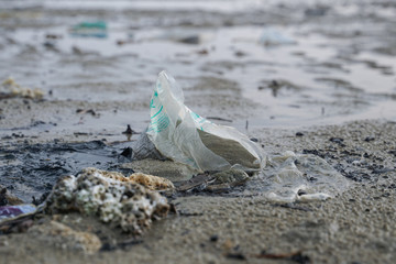 Lok Kawi, Kota Kinabalu, Sabah, Malaysia - September 08, 2019: There is a lot of rubbish left in Lok Kawi Beach. This rubbish are dumped into the sea and washed away to this beach.