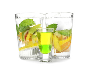 Different tasty cocktails on white background