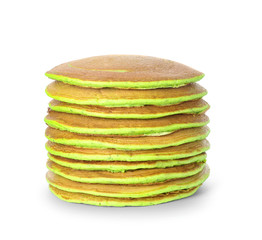 Tasty green pancakes on white background