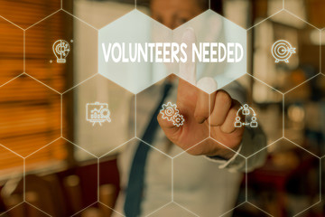 Conceptual hand writing showing Volunteers Needed. Concept meaning need work or help for...
