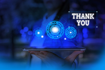 Text sign showing Thank You. Business photo text a polite expression used when acknowledging a gift or service Woman wear formal work suit presenting presentation using smart device