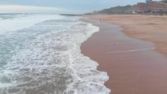 Aerial shot of Ocean Waves crushing in Biarritz Beach Resort - Basque Country South West of France