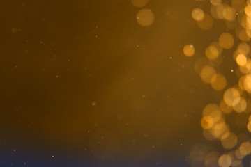 orange shining sparkles one side frame bokeh texture - nice abstract photo background