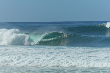 massive perfect surfing wave at the famous banzai pipeline beach in hawaii