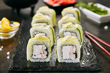 Macro Shot of Snow Crab Uramaki Sushi Rolls in Japanese Restaurant